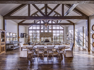 Photo of a barn style dining room.