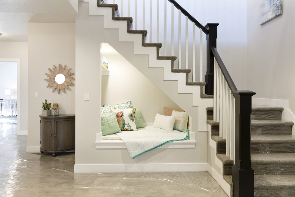 Example of an under stair: Reading nook underneath stairs with perfect ambience.